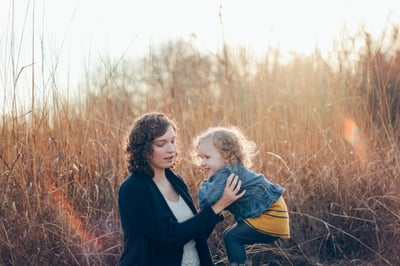 Mother and Child Waiting to Hear on Mortgage Approval